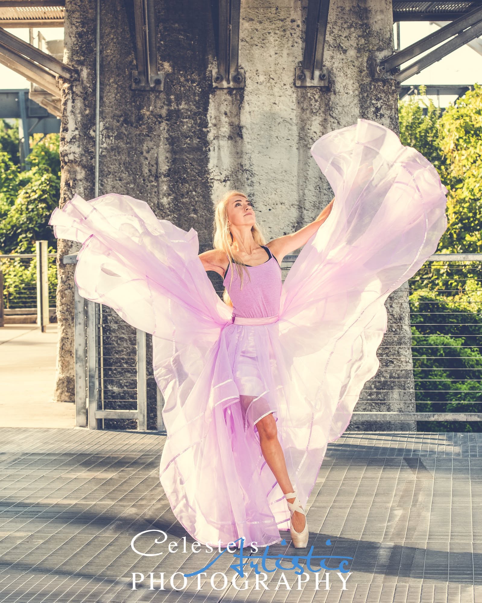 Christina dancing in flowing dress outdoors